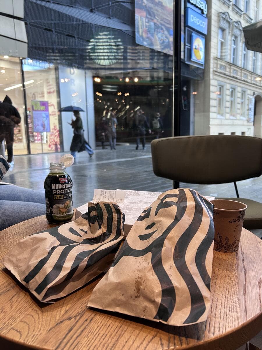 Rainy day at a café, city street outside